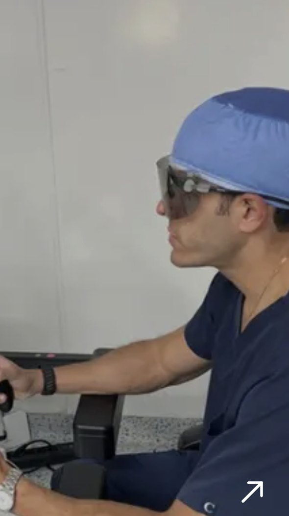 Dr. Abdelrahman Lotfy operating with advanced surgical technology